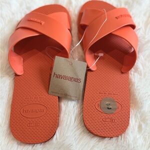 Havaianas Aqua Sandals in the color Sunset Orange.